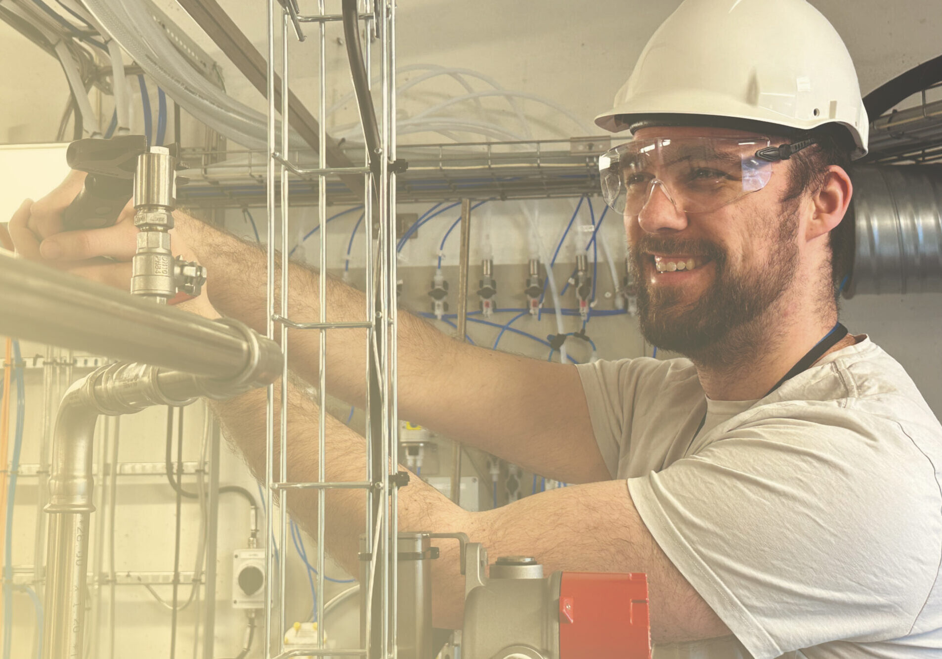 Man wearing hard hat working at our r&d center